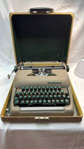 lot 94 image: Smith-Corona Sterling Portable Typewriter with Case
