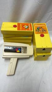 lot 161 image: Fisher-Price Movie Viewer with Film Reels Collection