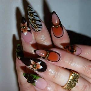lot 13129 image: Stiletto Press on Nails Long Fake Nails Black French Tip False Nails with Flower Zebra Stripes Designs Cute Glossy Artificial Nails for Women 24Pcs