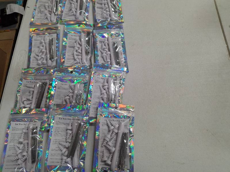 lot 8594 image: 12 Packs Ear Wax Removal, Ear Wax Removal Tool Reusable and Washable Replacement Soft Silicone Tips for Cleaner Earwax, Ear Wax Removal Kit Contains 7 Types of Ear Cleaner Tools