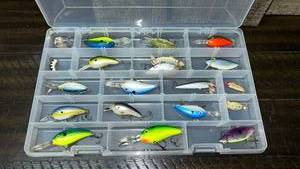 lot 18 image: Fishing Lure Tackle Box Collection with Spoons and Crankbaits