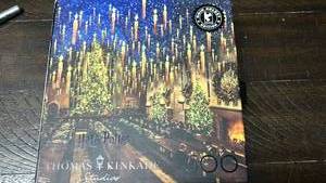 lot 66 image: Thomas Kinkade Harry Potter puzzle