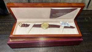 lot 73 image: USDA Kansas Farm Service Agency Gold-Tone Wristwatch with Presentation Box