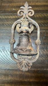 lot 82 image: Cast Iron Wall Bell with Ornate Scrollwork Frame