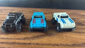 lot 5459 image: Schaper Stomper 4x4 Mini Monster Trucks Set of 3