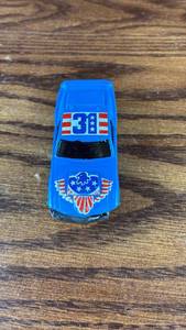 lot 5468 image: Blue Die-Cast Racing Car with Patriotic Graphics Number 3