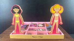 lot 5469 image: Melissa & Doug Magnetic Wooden Dress-Up Dolls Set with Clothing