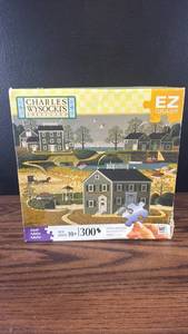 lot 5479 image: Charles Wysocki Americana 1300 Piece Jigsaw Puzzle