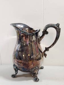 lot 92 image: Lunt Silver Plated Water Pitcher with Ornate Handle and Feet
