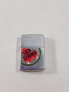 lot 108 image: Vintage Get Lucky Lucky Strike Zippo Lighter