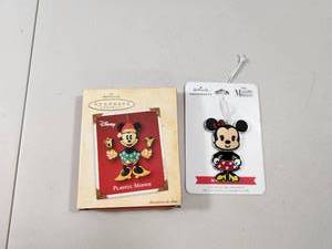 lot 125 image: Pair of Hallmark Keepsake Disney Playful Minnie Mouse Christmas Ornaments