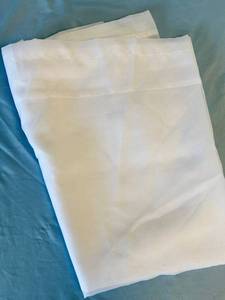 lot 134 image: Pair of white sheer curtain panels, 41 W x 64 L - Retail $15