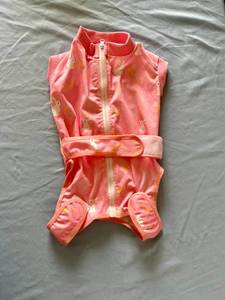 lot 156 image: Pink Bunny Print Dog Pajamas One Piece, Large  - Retail $0