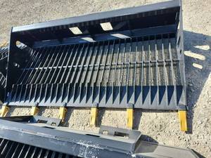 lot 2421 image: Unused Wolverine Skid Steer SkeletonRock Bucket  SB78