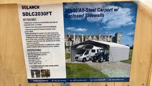 lot 129 image: Unused ShelterLogic 20x30 All-Steel Carport with Enclosed Sidewalls SDLC2030FT