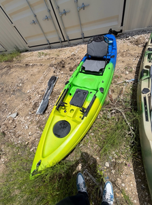 lot 810 image: Green and blue unused Fishing Kayak with Padded Seat and Paddle
