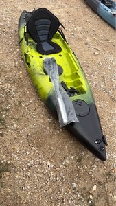 lot 816 image: Lime green and black unused Single Person Fishing Kayak with Paddle and Seat
