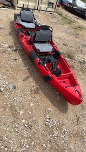 lot 822 image: Red unused Tandem Fishing Kayak with Pedal Drive System