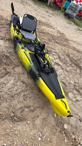 lot 824 image: Yellowgreenblack unused Hooked Kayaks Fishing Kayak with Pedal Drive System