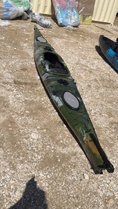 lot 832 image: Green camo unused Single Person Touring Kayak with Paddle and Seat Cushion