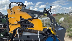 lot 405 image: Compact Track Skid Steer Loader with Bucket Attachment
