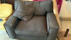 lot 901 image: Ashley Furniture charcoal fabric chair 38X50X39 matches lot 900 and its located in garage