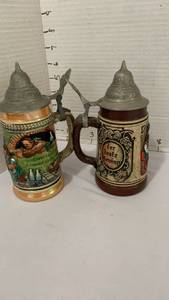 lot 1106 image: German Beer Steins with Pewter Lids Set of Two