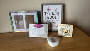 lot 1213 image: Frames, Peanuts Plaque, and Precious Moments Dish