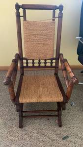 lot 2008 image: Wooden Rocking Chair with Woven Rope Seat and Back 39X22X19 located in basement