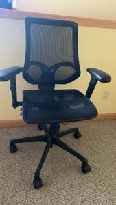 lot 2010 image: Black Mesh Ergonomic Office Chair 51X38X17 located in basement