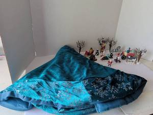 lot 3027 image: Christmas Village Figurines with Snowflake Fabric Tree Skirt