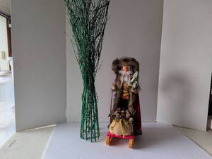 lot 3031 image: Christmas Nutcracker with Fur Hat, and lit twig decoration