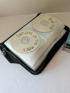lot 3047 image: DVD binder and CDs