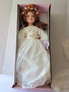 lot 3133 image: J. Misa Collection Porcelain Doll with White Dress and Feather wings