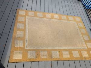 lot 4107 image: 7 ft 6 in by 5 ft. 3. Outdoor indoor rug on back deck