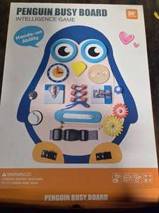lot 1128 image: Penguin Busy Board