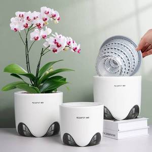 lot 32575 image: Meshpot 6 inch Orchid Pots with Holes for Repotting with Excellent Airflow, Set of 1, Double Layer Plastic Imitate Ceramic Orchid Planter, Clear Orchid Pot Match Decorative Orchid Container - Retail $18