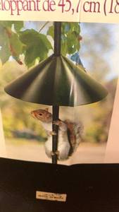 lot 44026 image: 18 inch Wrap Around Squirrel Baffle - Retail $23