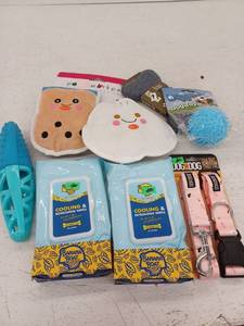 lot 14939 image: Dog Care Bundle with Toys, Collars, and Grooming Supplies