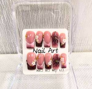 lot 26472 image: Handmade Press on Nails Medium Square Fake Nails Red French Tip with 3D Flower Designs luxury Pearl Charm Glossy Cute Acrylic Nails for Women 10pcs (Size M�� - Retail $15