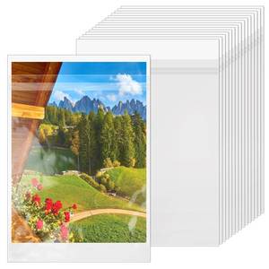 lot 31227 image: VOKOY 100 Pack 9 38 x 12 25 inches Crystal Clear Sleeves Storage Bags, Self Sealing Cellophane Bags Magazine Sleeves Protectors for 9x12 Photo Mats Art Prints Drawings - Retail $10