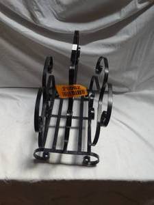 lot 25062 image: Metal magazine rack.