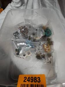 lot 24983 image: A ton of misc brackets, neck less and earrings.