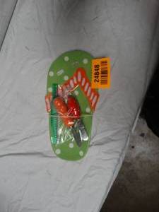 lot 24848 image: MSC Flip Flop Plate w Butter Knives