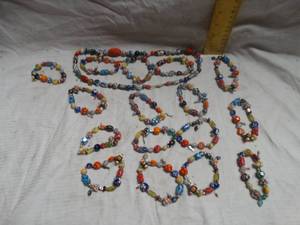 lot 24964 image: Huge Lot of Vintage Venetian Inspired Eye Skunk Beaded Necklace & Bracelets.