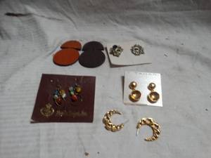 lot 24970 image: T Tahari Gold tone drop earings, silver tone, and retired Premier Designs cat eye glass dangle earrings