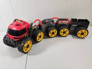 lot 99 image: Buddy L All Terrain 10 Wheel Drive Truck with Power Unit