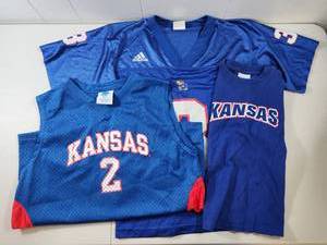 lot 131 image: Kansas Jayhawks NCAA Basketball and Football Jersey Collection Kids