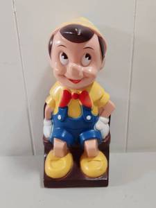 lot 160 image: Disney Pinocchio Play Pal Plastics Money Bank