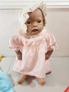lot 168 image: Baby Doll with Red Bath Tub and Clothing Set